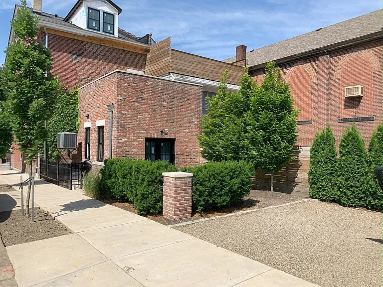 Parking pad and backyard