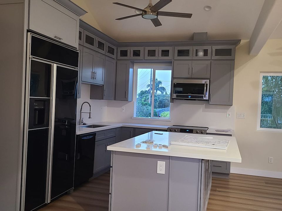 All-electric open kitchen with gather-round island