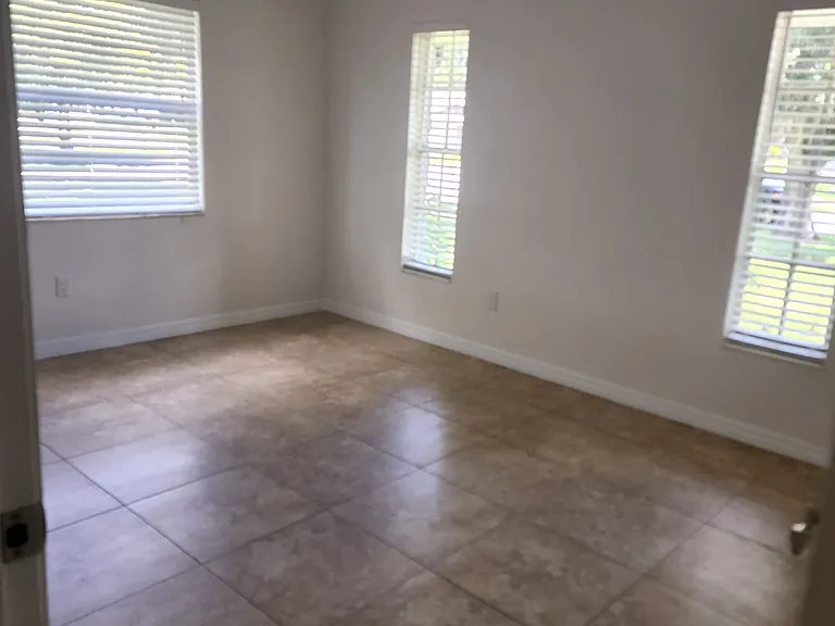 There are two identical bedrooms about 10 x 10 each. They each have a mini walk in closet with plenty of storage space.