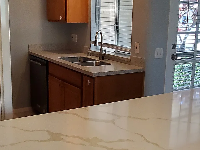 Kitchen, quartz breakfast bar, back door