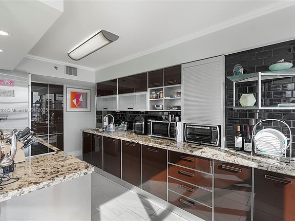5th image of 3600 Mystic Pointe Dr APT 901
