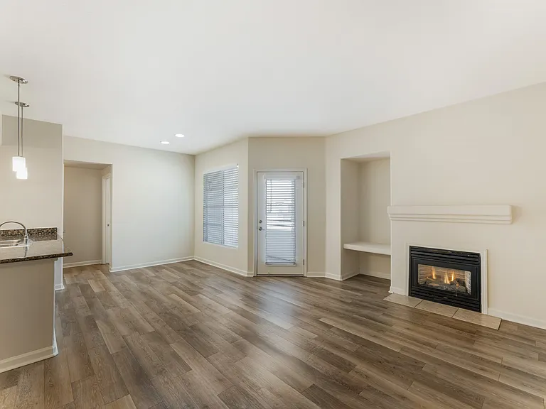 Some units feature cozy firepits and beautiful laminate wood floors, adding warmth and style to your modern living space at Ascent at the Galleria.
