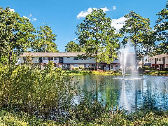 Looking across the stocked fishing pond towards the property at Ascend at Savannah