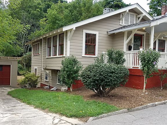 front with drive and garage