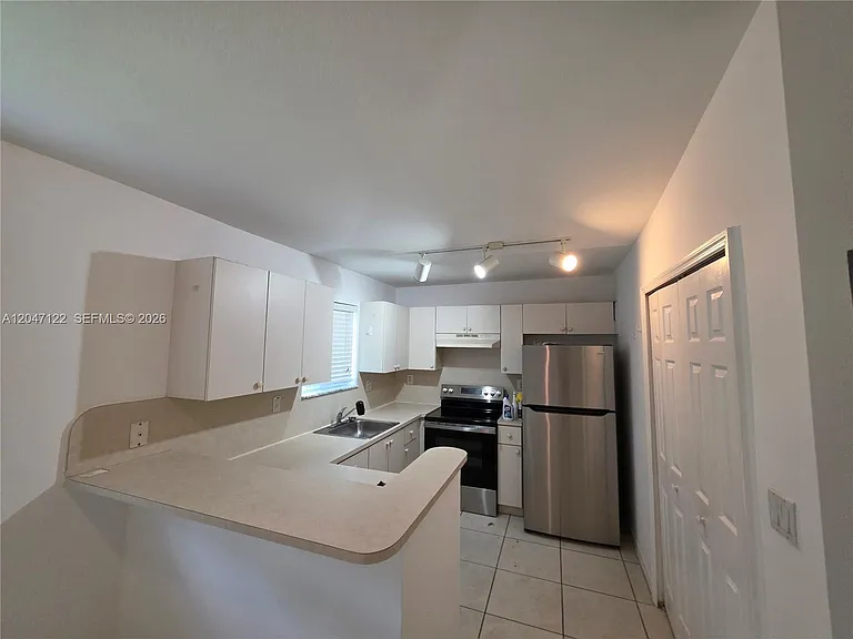 3398 NE 9th Dr #204 — Photo 9