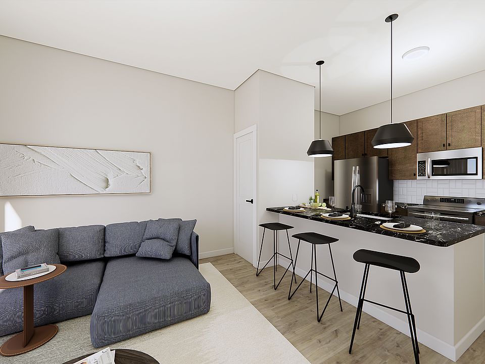 Experience the elegance of open-concept living in this beautifully designed apartment.