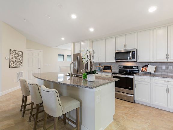 Kitchen with plenty of storage cabinets and center island