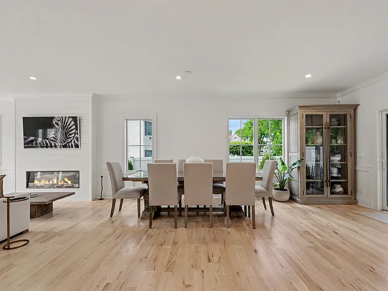 The townhome features 9 foot ceilings throughout a sophisticated living area filled with natural light.