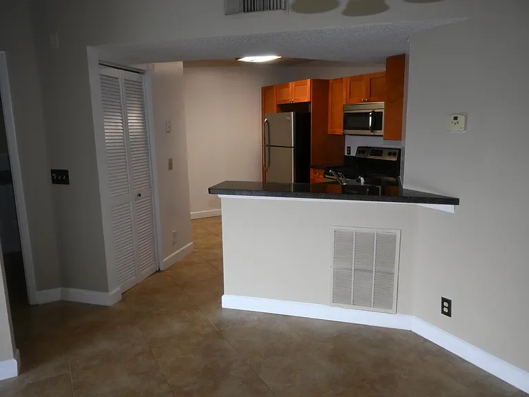 8721 Wiles Rd #305 — Photo 40