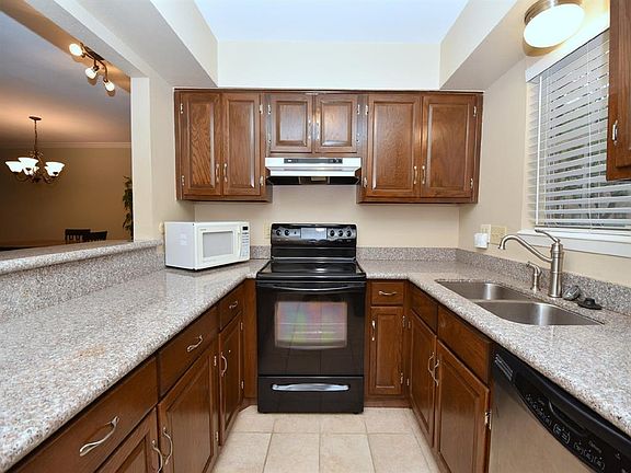 Updated kitchen. Lots of storage. Granite counter tops.