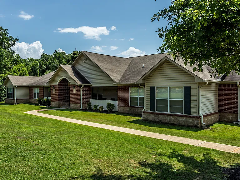 Explore this charming suburban home surrounded by nature, perfect for family living.