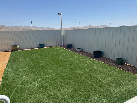 private backyard with artificial turf