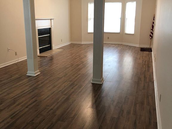 Living room looking at the front window.