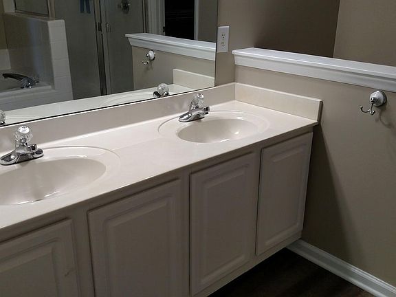 Dual vanity master bathroom with garden tub