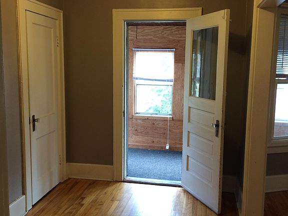 FRONT FOYER TO PORCH AND BIG HALL CLOSET