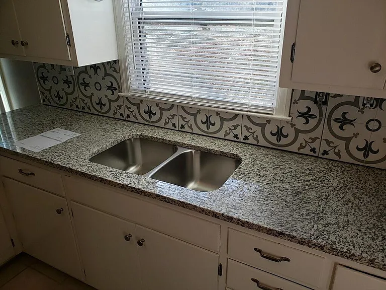 Another view of kitchen, prior to new faucet being installed.