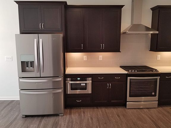 Brand New Whirlpool Fridge, Range, and Hood