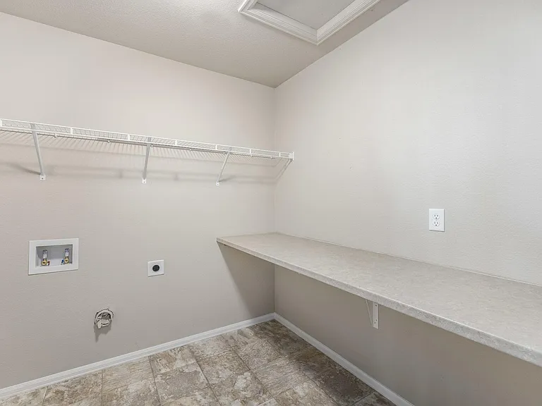 Large primary bedroom walk in closet