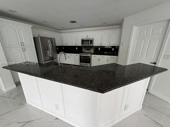 2nd image of 16286 Erie Pl #16286