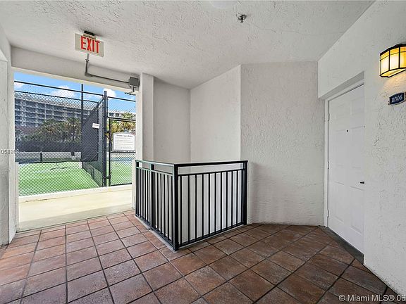 Front entrance of the corner unit 11306 with VIP entrance to the tennis courts!