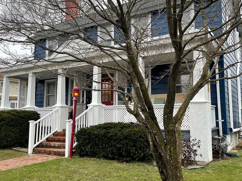 Newly painted historic Tri-plex in historic district of Keyport. Walk to waterfront. Townhouse is located on right of home.