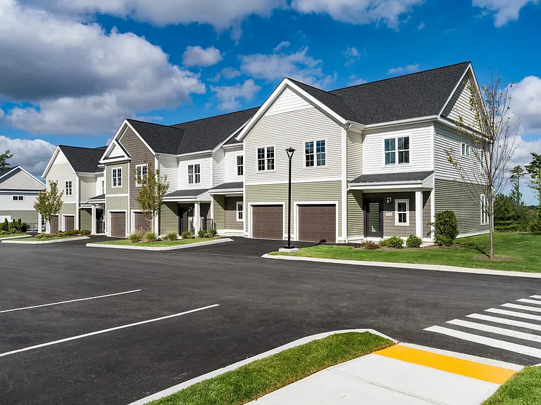 Spacious townhomes with private garages and charming front entries offer the comfort and feel of a traditional neighborhood.