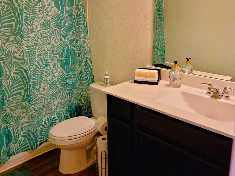 Full size bathroom with shower and tub located in the second floor