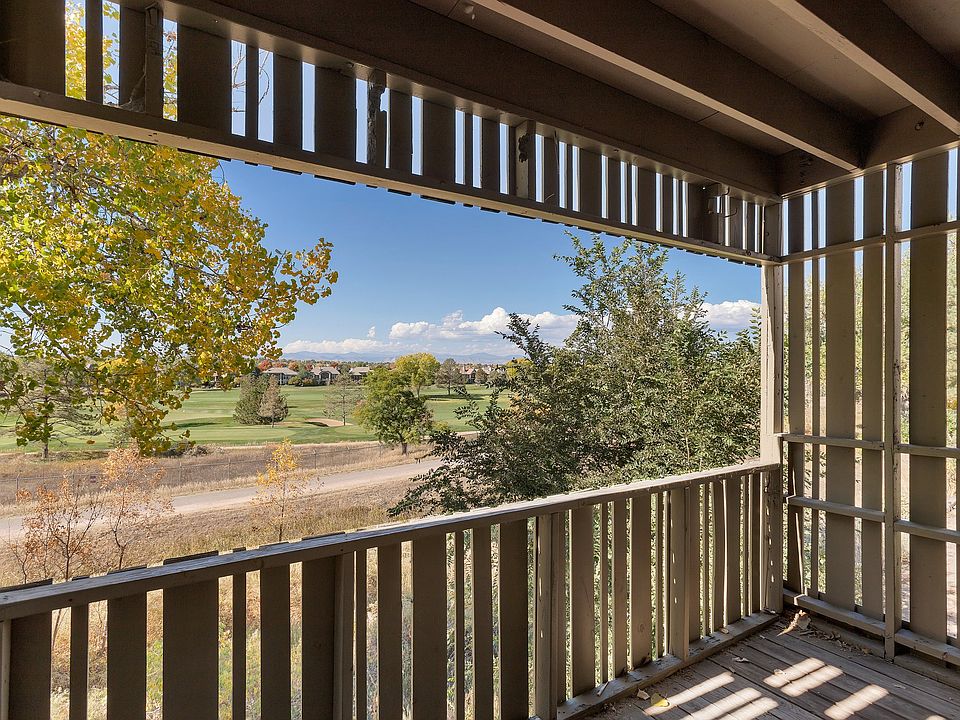 Large balcony with mountian, golf course and Highline Canal views.