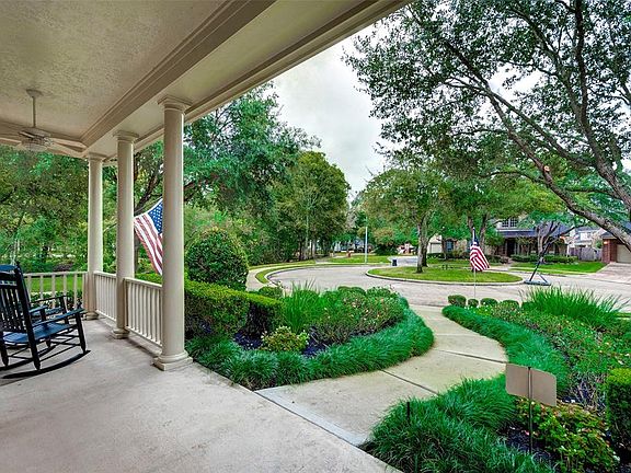 Love this good size front porch! Imagine enjoying a cold lemonade watching the world go by, visiting with neighbors or watching the kids play. Just look at this tranquil setting on a cul de sac lot with the pocket park across the street.