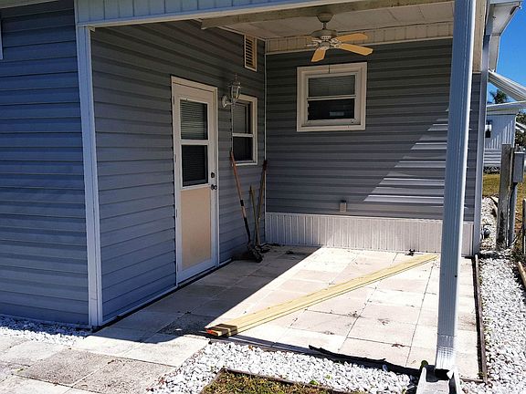 Back porch with ceiling fan