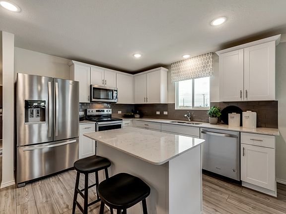 Model Representation - Spacious island kitchen