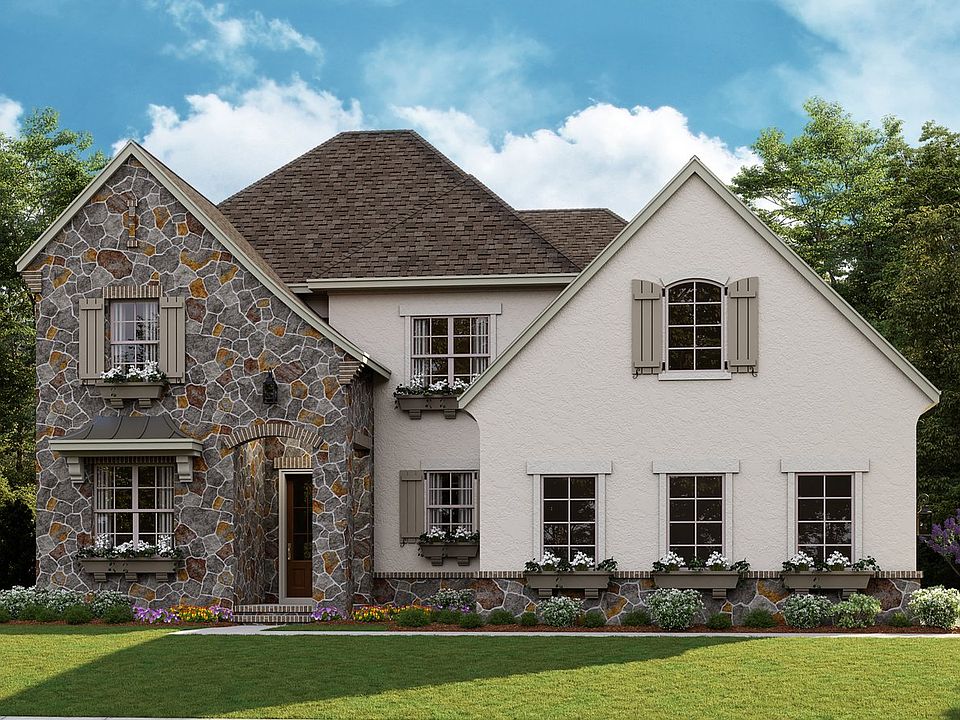 Huntley - French Cottage 3-Car Side Load Garage Note Renderings may show optional features