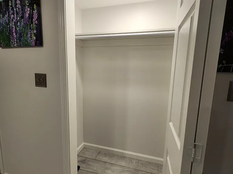 Closet has plenty of space and lights up
