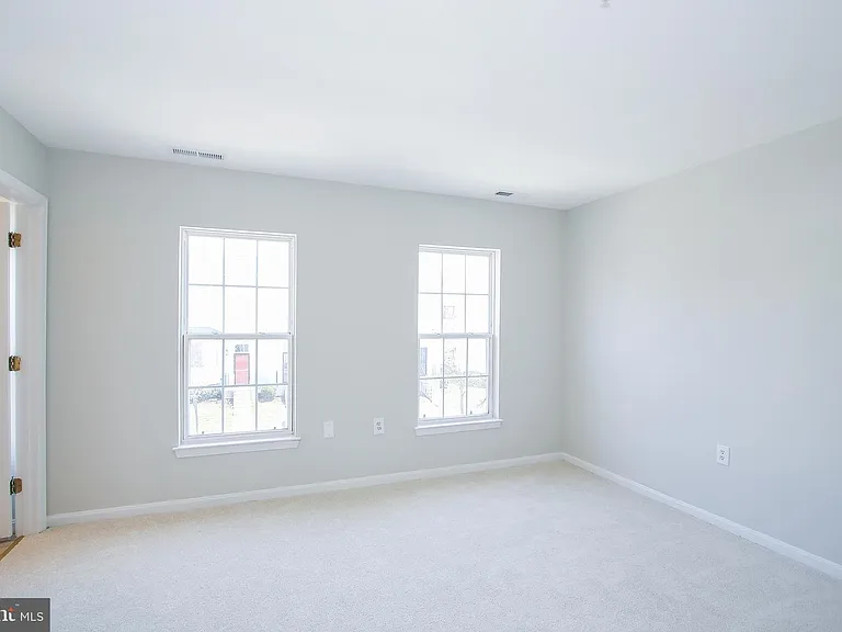 Different view of primary bedroom