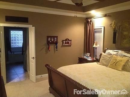 Foyer
						:
						Large, open foyer that leads to formal dining (playroom) and living room