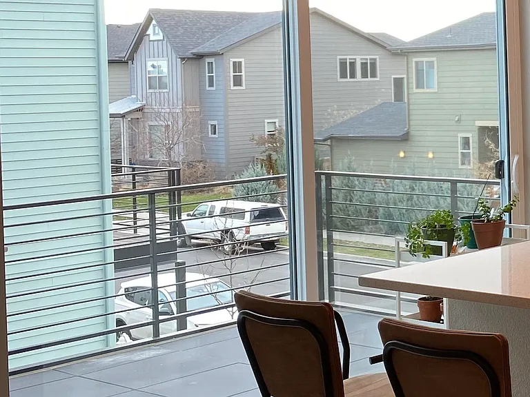 Glass doors to exit to balcony.