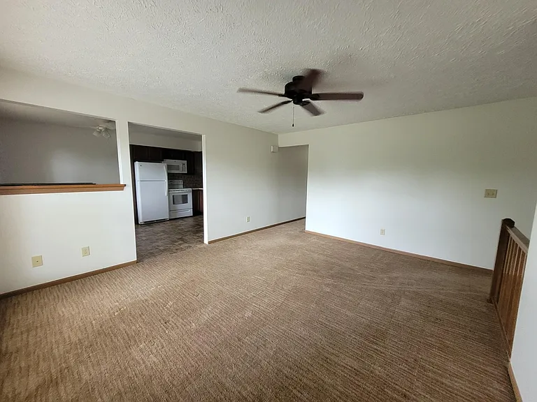 Living room looking into the kitchen.