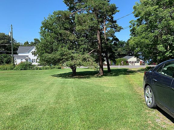 View down driveway to street