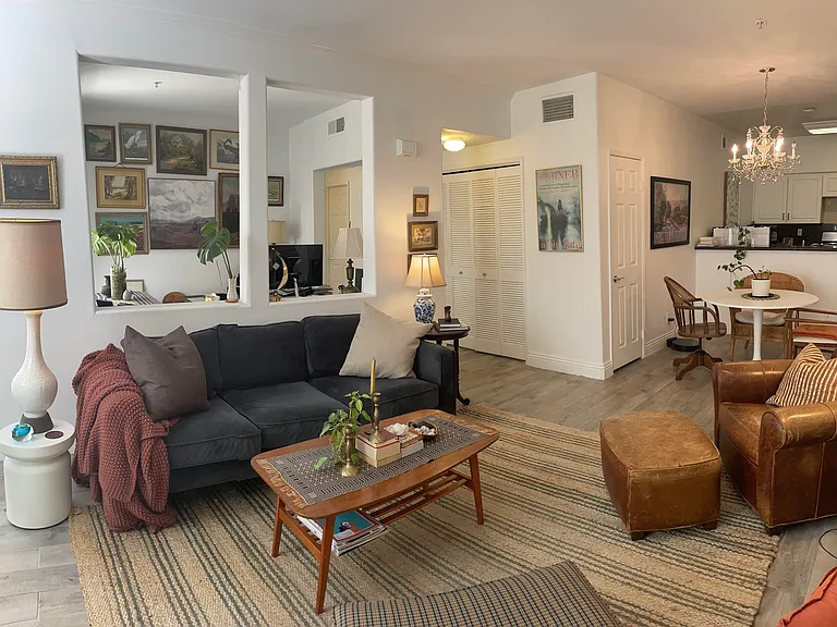 Main living area with view into bonus room and over to dining and kitchen areas.