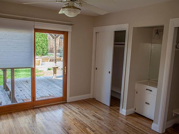 Master bedroom with vanity, 2 closets and French Doors to backyard.