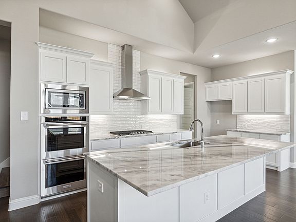 Kitchen in the Eliot home plan by Trophy Signature Homes
