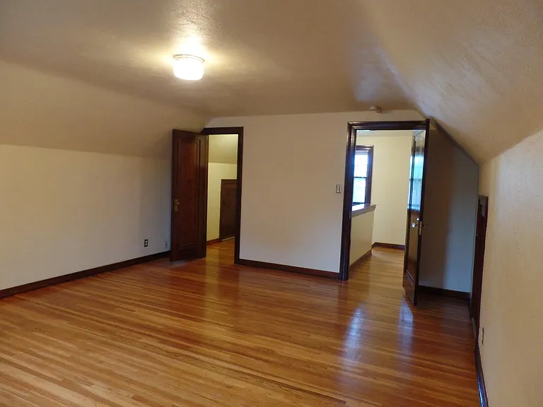 Upper Bedroom. Walk in closet to the left, landing to go back downstairs to the right.