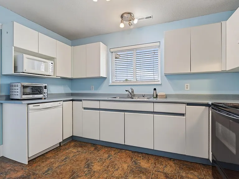 7715 Luckakuck Pl — Photo 15