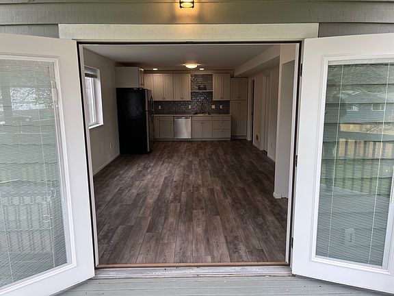 French doors into open concept living area