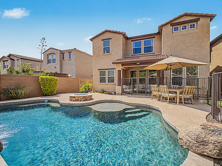Take in the beautiful view of the backyard, a space you'll truly enjoy year round. Both the home and backyard have been exceptionally well maintained and are in excellent condition.