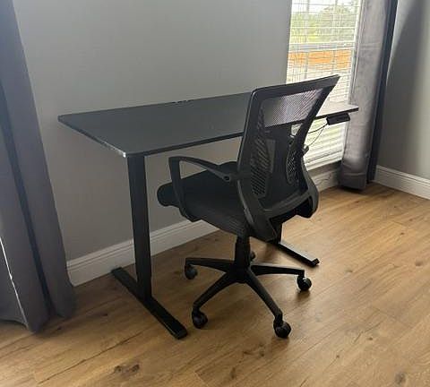 electric standing desk, ergonomic chair