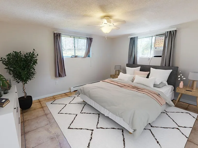 Bedroom 5. This image shows a virtually furnished space. Bedrooms come unfurnished.