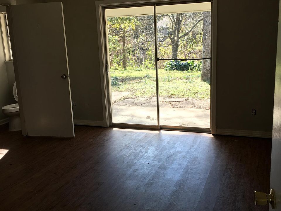 Master bedroom overlooks privat back yard