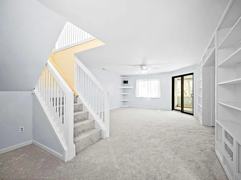 Lower level living area with walk out to screened-in-porch