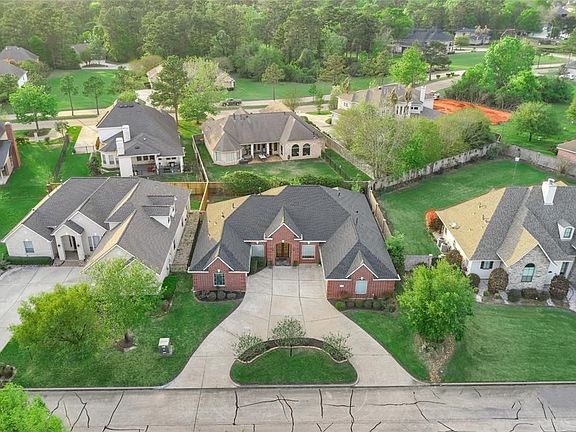 Large circle driveway and extra parking.